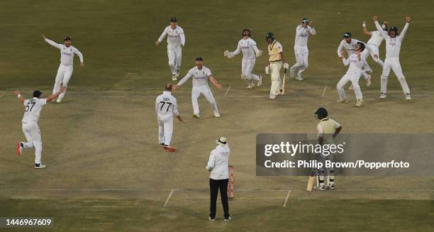 Jack Leach traps Naseem Shah of Pakistan lbw as England's Ollie Robinson , Ben Duckett, Zak Crawley, Ben Stokes, Ollie Pope, Joe Root, Will Jacks,...