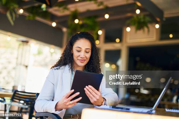 small business owner, cafe or woman with tablet and laptop for research, communication or networking with smile. happy, tech or startup employee for social network, website review or social media seo - business smile stockfoto's en -beelden