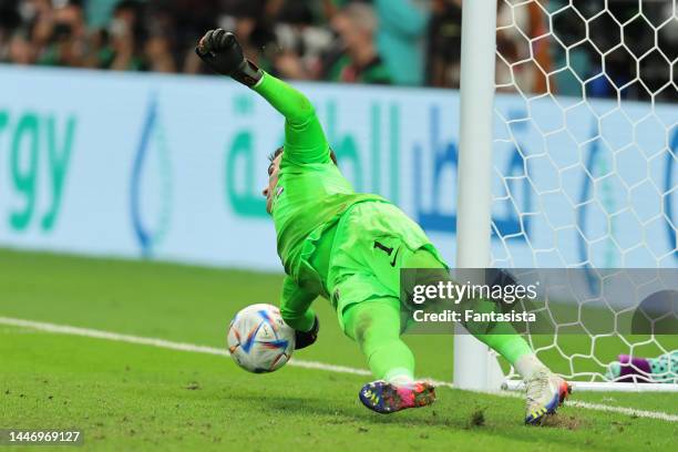 Dominik Livakovic of Croatia makes one of three penalty saves during the shoot out to become the team's hero and help securte the passage ot the next...