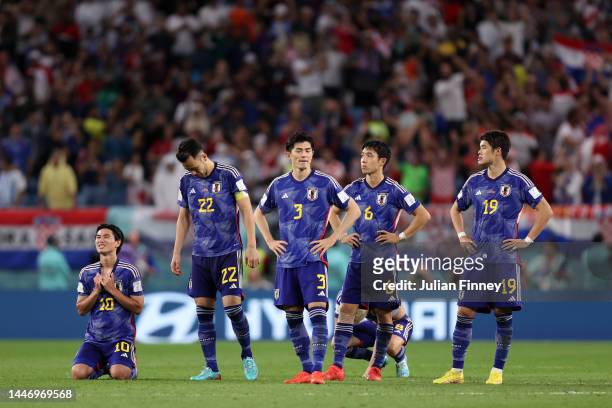 Japan players react in the penalty shoot out during the FIFA World Cup Qatar 2022 Round of 16 match between Japan and Croatia at Al Janoub Stadium on...