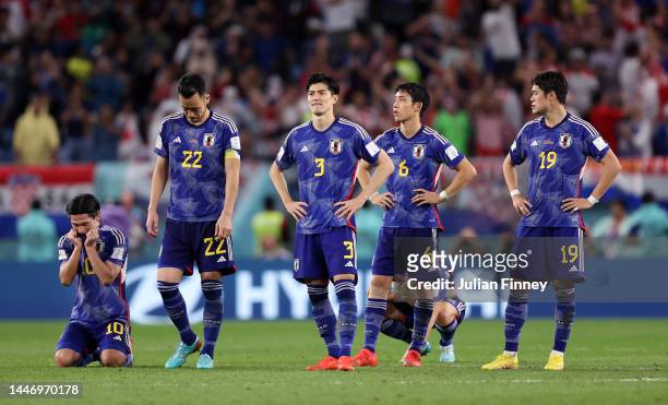 Japan players show dejection after their defeat in the penalty shoot out during the FIFA World Cup Qatar 2022 Round of 16 match between Japan and...
