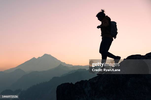 Alpine In Ridge Line Silhouette Of Woman Hiking Alpine Ridgeline In Washington State High ...