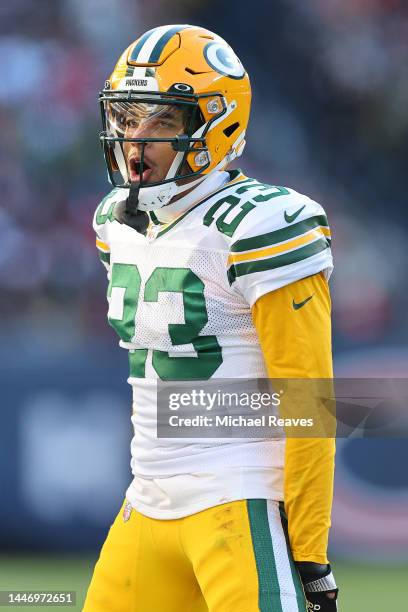 Jaire Alexander of the Green Bay Packers celebrates an interception against the Chicago Bears at Soldier Field on December 04, 2022 in Chicago,...