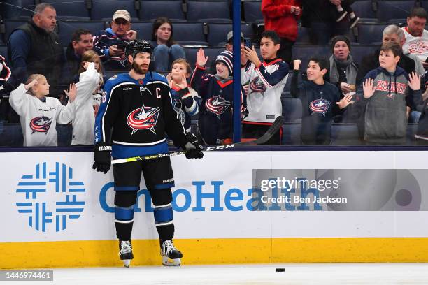 Boone Jenner of the Columbus Blue Jackets warms up prior to a game against the Detroit Red Wings at Nationwide Arena on December 4, 2022 in Columbus,...