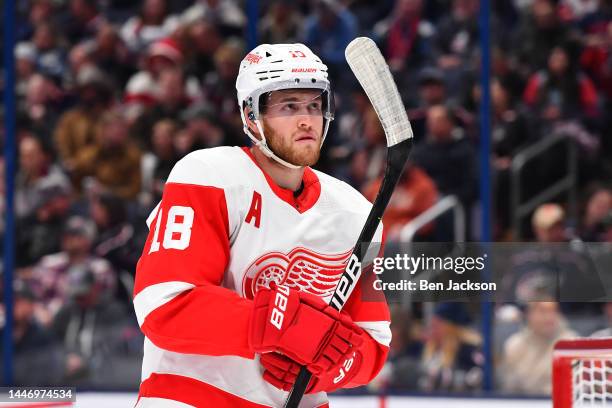 Andrew Copp of the Detroit Red Wings lines up prior to a face-off during the first period of a game against the Columbus Blue Jackets at Nationwide...