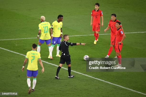 Referee Clement Turpin gives a penalty to Brazil during the FIFA World Cup Qatar 2022 Round of 16 match between Brazil and South Korea at Stadium 974...