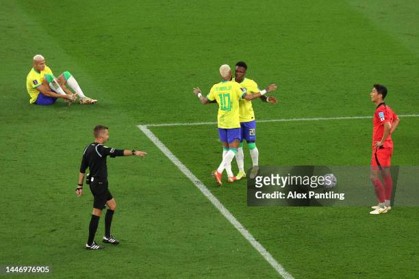 Referee Clement Turpin gives a penalty to Brazil as Vinicius Junior and Neymar of Brazil react during the FIFA World Cup Qatar 2022 Round of 16 match...