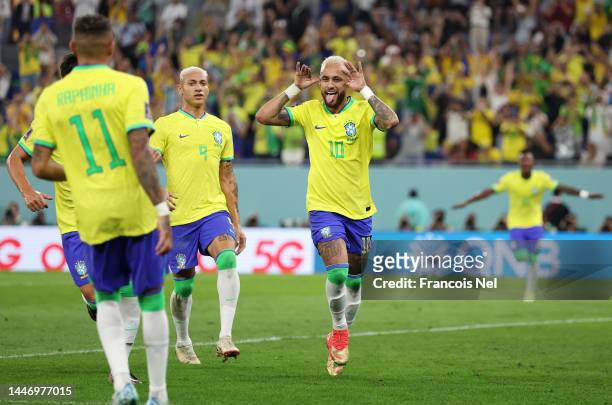 Neymar of Brazil celebrates after scoring the team's second goal during the FIFA World Cup Qatar 2022 Round of 16 match between Brazil and South...