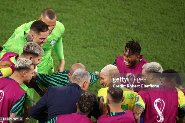 Richarlison of Brazil celebrates with teammates after scoring the team's third goal during the FIFA World Cup Qatar 2022 Round of 16 match between...