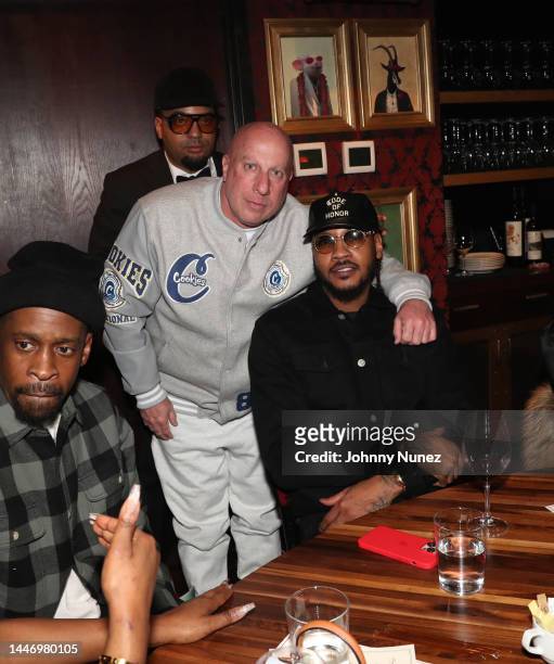 Dorian Harrington, Steve Lobel, and Carmelo Anthony attend Amar'e Stoudemire's 40h Birthday Party at Catch NYC on December 04, 2022 in New York City.