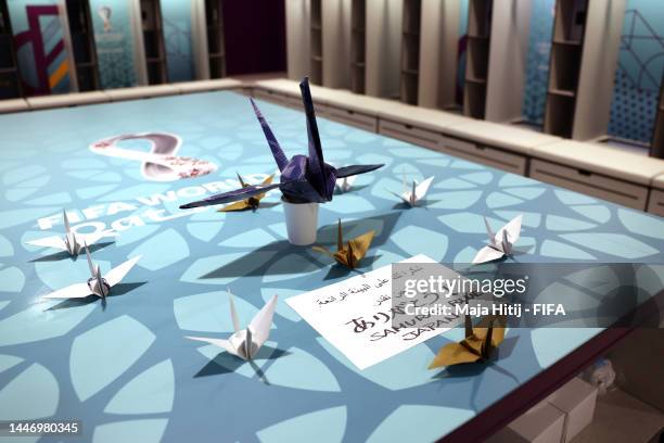 Paper cranes and thank you message are displayed in the Japan dressing room after their defeat through the penalty shootout after the FIFA World Cup...