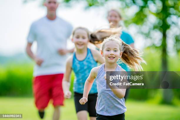 family run - kids track and field stock pictures, royalty-free photos & images