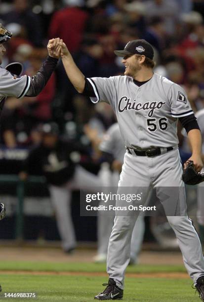 Mark Buehrle and Chris Widger of the Chicago White Sox celebrates after they defeated the Houston Astros 7-5 in Game 3 of the World Series on October...