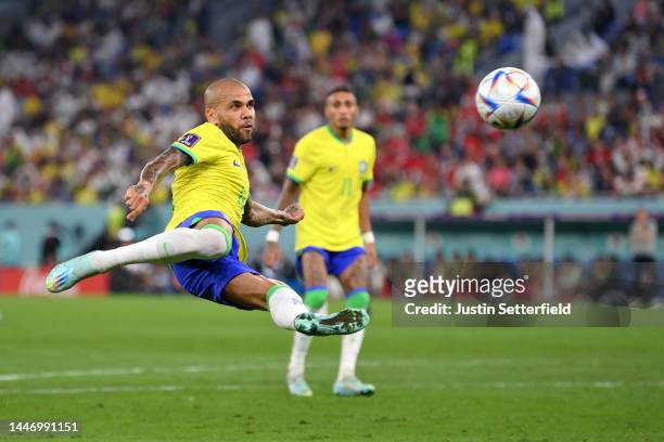 Dani Alves of Brazil takes a shot during the FIFA World Cup Qatar 2022 Round of 16 match between Brazil and South Korea at Stadium 974 on December...