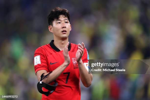 Heungmin Son of Korea Republic applauds fans after the 1-4 loss during the FIFA World Cup Qatar 2022 Round of 16 match between Brazil and South Korea...