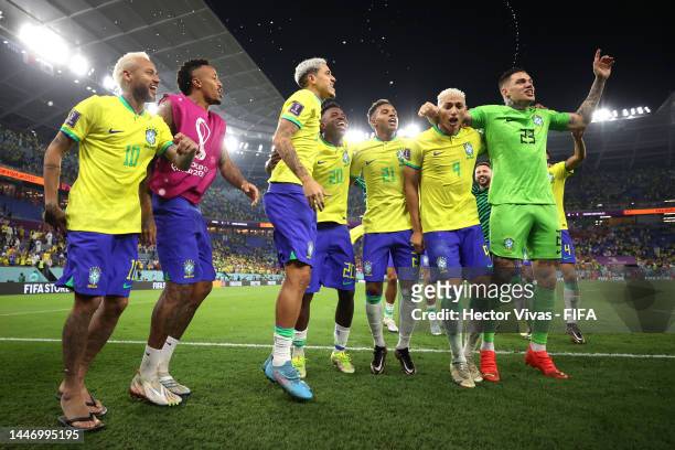Neymar, Eder Militao, Pedro, Vinicius Junior, Rodrygo and Richarlison of Brazil celebrate after the team's victory during the FIFA World Cup Qatar...