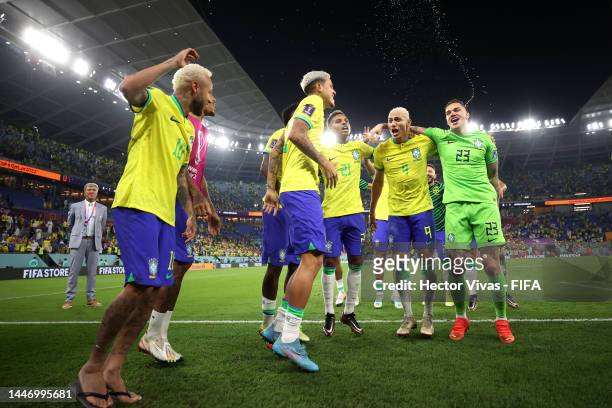 Neymar, Eder Militao, Pedro, Vinicius Junior, Rodrygo and Richarlison of Brazil celebrate after the team's victory during the FIFA World Cup Qatar...