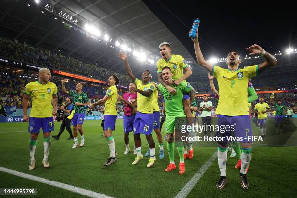 Pedro, Vinicius Junior, Ederson, Richarlison and Lucas Paqueta of Brazil celebrate after the team's victory during the FIFA World Cup Qatar 2022...