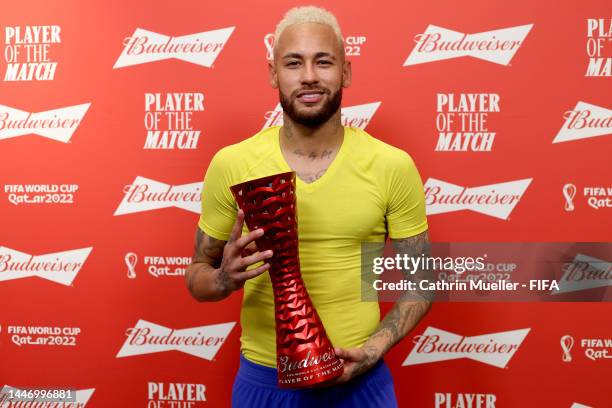 Neymar of Brazil poses with the Budweiser Player of The Match trophy following during the FIFA World Cup Qatar 2022 Round of 16 match between Brazil...