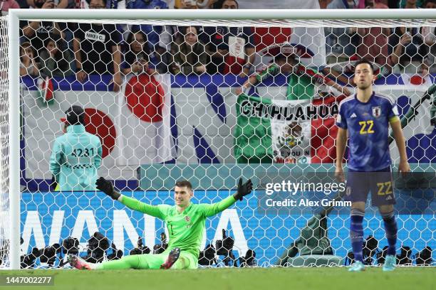 Dominik Livakovic of Croatia celebrates after saving the fourth penalty by Maya Yoshida of Japan in the penalty shoot out during the FIFA World Cup...