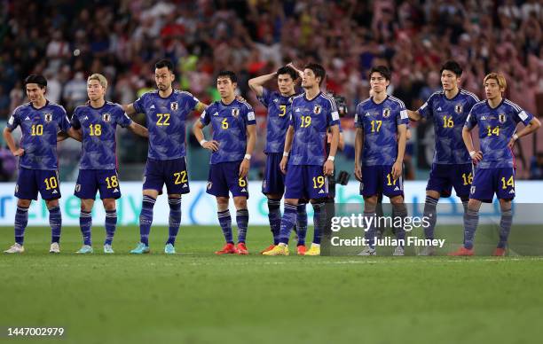 The Japanese team looks dejected in the penalty shoot out during the FIFA World Cup Qatar 2022 Round of 16 match between Japan and Croatia at Al...