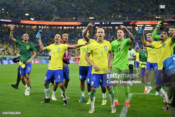 Marquinhos, Ederson and Richarlison of Brazil celebrate during the FIFA World Cup Qatar 2022 Round of 16 match between Brazil and South Korea at...