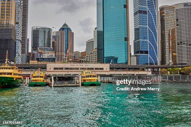 transport and office buildings on sydney harbour - circular quay stock pictures, royalty-free photos & images