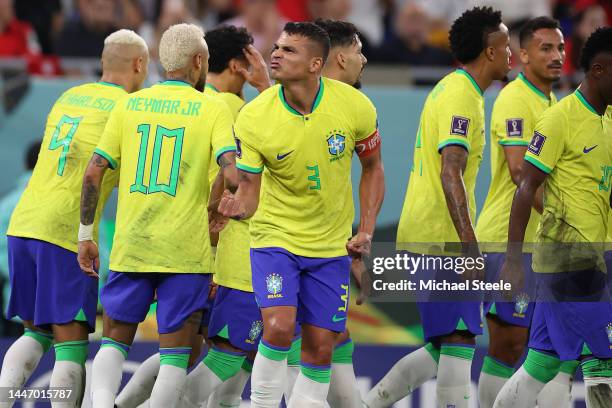 Thiago Silva of Brazil celebrates his side's fourth goal scored by Lucas Paqueta during the FIFA World Cup Qatar 2022 Round of 16 match between...