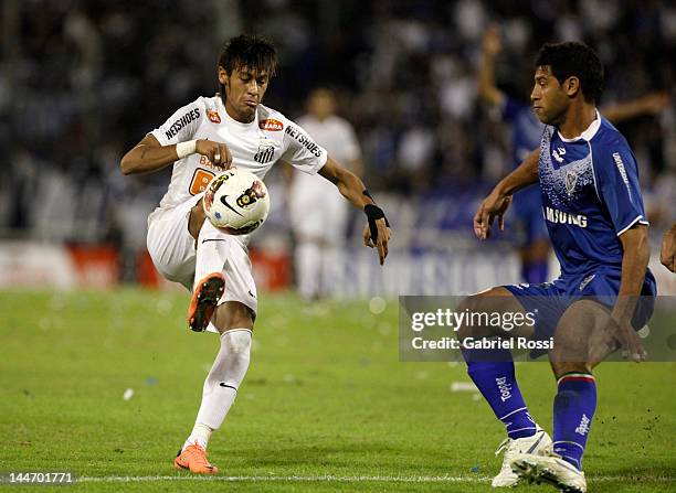 Neymar of Santos and Sebastian Dominguez of Velez in action during a match between Velez Sarsfield and Santos as part of the Copa Libertadores 2012,...