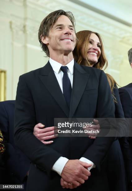 Actress Julia Roberts and her husband cinematographer Daniel Moder attend a reception for the 2022 Kennedy Center honorees at the White House on...