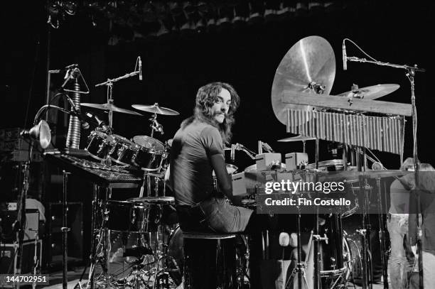 17th DECEMBER: Drummer Neil Peart from Canadian progressive rock band Rush posed at his drum kit in the Public Auditorium in Cleveland, Ohio on 17th...