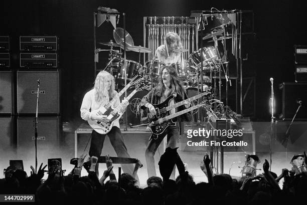 12th FEBRUARY: Guitarist Alex Lifeson, bassist Geddy Lee and drummer Neil Peart from Canadian progressive rock band Rush perform live on stage at the...