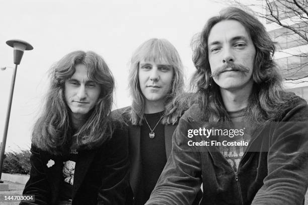 17th DECEMBER: Bassist Geddy Lee, Guitarist Alex Lifeson and drummer Neil Peart from Canadian progressive rock band Rush posed in Cleveland, Ohio on...