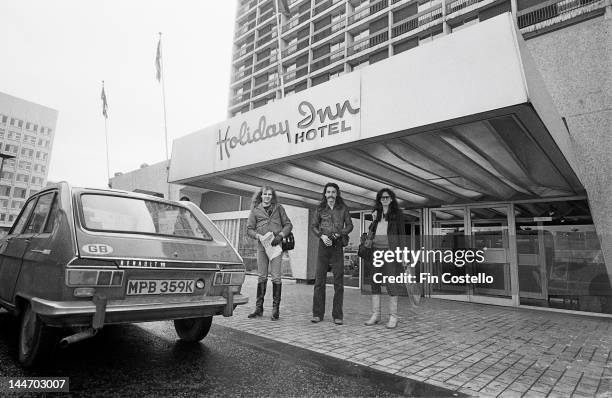 12th FEBRUARY: Canadian progressive rock band Rush pose outside the Holiday Inn hotel in Birmingham, England on 12th February 1978. Left to right:...