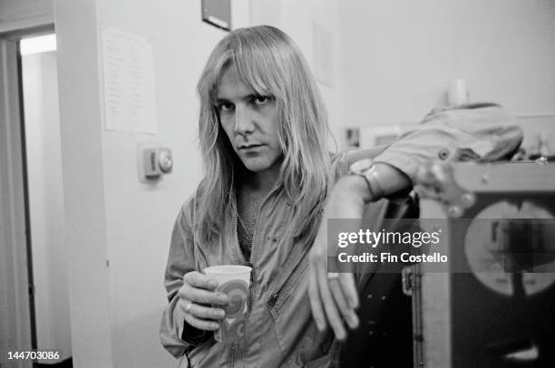 26th SEPTEMBER: Guitarist Alex Lifeson from Canadian progressive rock band Rush poses backstage at the Civic Auditorium during their 'A Farewell To...