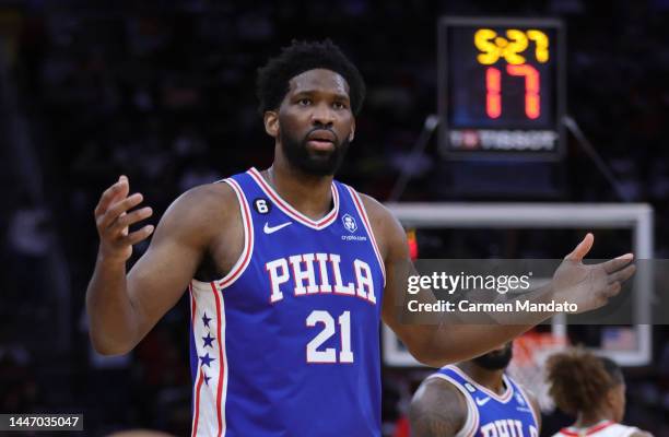 Joel Embiid of the Philadelphia 76ers reacts against the Houston Rockets during the first half at Toyota Center on December 05, 2022 in Houston,...