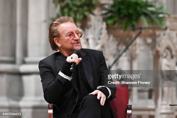 Bono discusses his new memoir "Surrender" with Washington National Cathedral Canon Historian Jon Meacham at the Washington National Cathedral on...