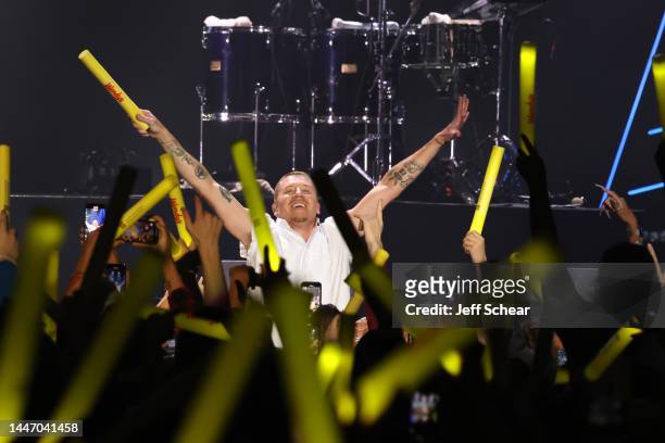 Macklemore performs onstage during iHeartRadio 103.5 KISS FM's Jingle Ball 2022 Presented by Capital One at Allstate Arena on December 05, 2022 in...
