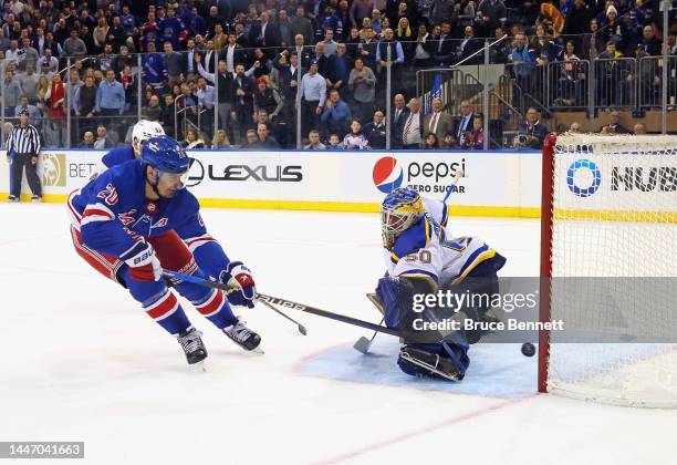 Chris Kreider of the New York Rangers scores a third period shorthanded goal against Jordan Binnington of the St. Louis Blues at Madison Square...