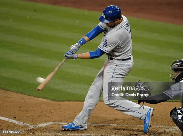 James Loney of the Los Angeles Dodgers hits an RBI double during the fifth inning of a baseball game against the San Diego Padres at Petco Park on...