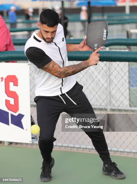 Young hits a backhand slice shot in the second round of the APP Sunmed Mesa Open Mixed PRO Doubles division at Legacy Sports Park on December 2, 2022...