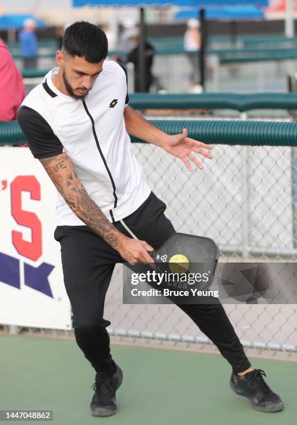 Young hits a backhand slice shot in the second round of the APP Sunmed Mesa Open Mixed PRO Doubles division at Legacy Sports Park on December 2, 2022...