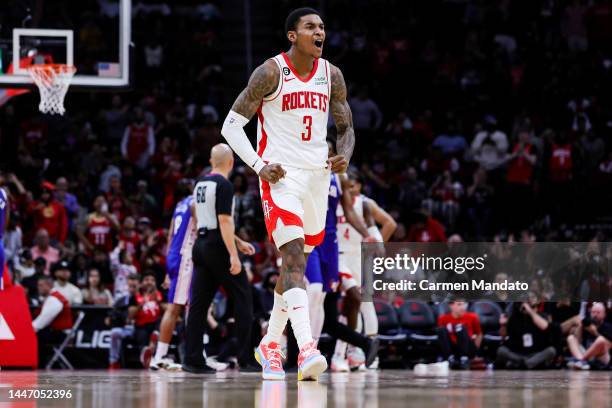 Kevin Porter Jr. #3 of the Houston Rockets reacts after making a basket in double overtime against the Philadelphia 76ers at Toyota Center on...