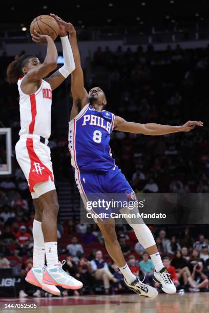 Jalen Green of the Houston Rockets puts up a basket over De'Anthony Melton of the Philadelphia 76ers during the first half at Toyota Center on...