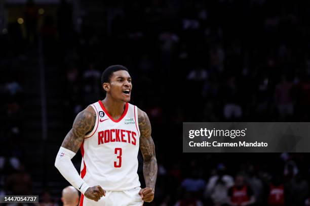Kevin Porter Jr. #3 of the Houston Rockets reacts after making a basket in double overtime against the Philadelphia 76ers at Toyota Center on...