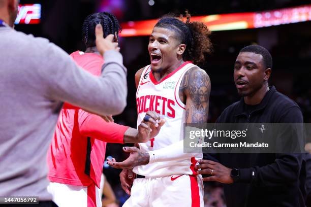 Jalen Green of the Houston Rockets celebrates with staff following overtime against the Philadelphia 76ers at Toyota Center on December 05, 2022 in...