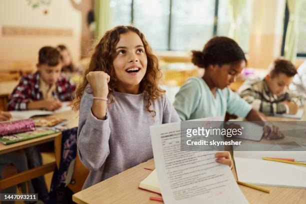 yes, i've got an a on my exam! - child report card stock pictures, royalty-free photos & images