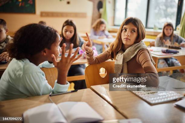 i don't want to talk to you! - class argument stockfoto's en -beelden
