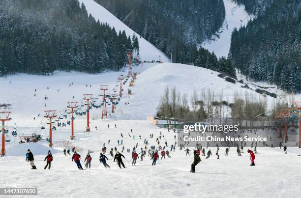 People go skiing at the Silk Road International Ski Resort on December 5, 2022 in Urumqi, Xinjiang Uygur Autonomous Region of China. Ski resorts in...