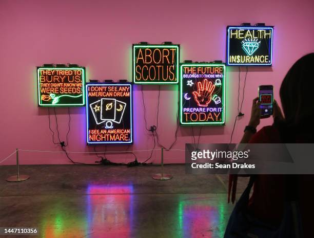 Neon light sculptures by Patrick Martinez are presented by the Charlie James Gallery of Los Angeles during Art Basel Miami Beach in the Miami Beach...
